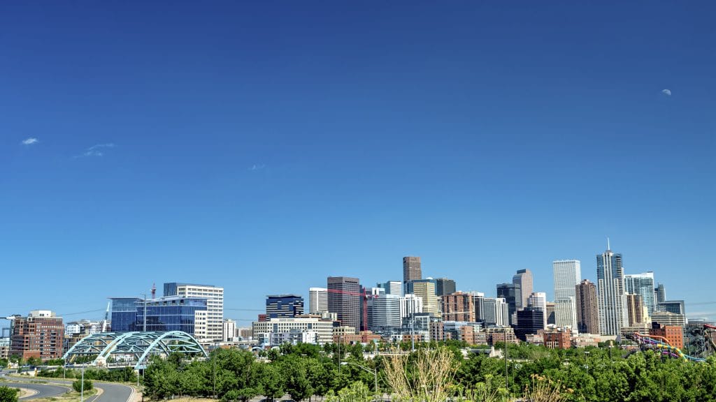 Denver-with-a-half-moon-in-the-sky-000056355998_Double-min